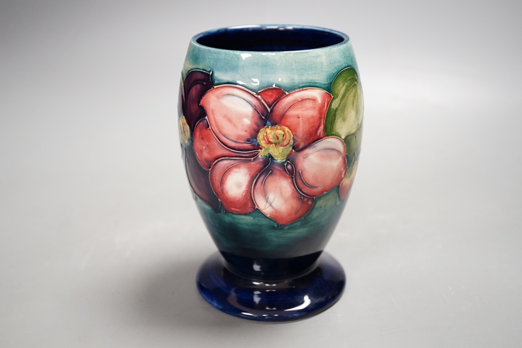 A small Moorcroft clematis vase, 15.5cm